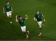 7 September 2021; James Collins, John Egan and Shane Duffy of Republic of Ireland celebrate their side's first goal, an own goal scored by Nikola Milenkovic of Serbia, during the FIFA World Cup 2022 qualifying group A match between Republic of Ireland and Serbia at the Aviva Stadium in Dublin. Photo by Ben McShane/Sportsfile