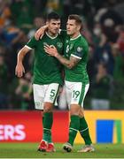 7 September 2021; John Egan and James Collins of Republic of Ireland after the FIFA World Cup 2022 qualifying group A match between Republic of Ireland and Serbia at the Aviva Stadium in Dublin. Photo by Stephen McCarthy/Sportsfile