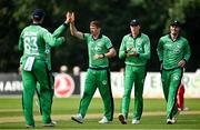8 September 2021; Craig Young of Ireland, centre, celebrates with team-mates after claiming the wicket of Zimbabwe's Regis Chakabva during match one of the Dafanews International Cup ODI series between Ireland and Zimbabwe at Stormont in Belfast. Photo by Seb Daly/Sportsfile