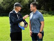 8 September 2021; Mícheál Ó Muircheartaigh with UCD Gaelic Games Executive Ger Brennan at UCD during the reunion of club and intercounty GAA players trained by Mícheál Ó Muircheartaigh as part of a training group of Dublin based players in the 1970, '80's and '90's at UCD in Belfield, Dublin. Photo by Piaras Ó Mídheach/Sportsfile