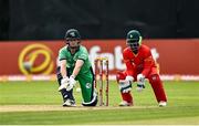 8 September 2021; William Porterfield of Ireland plays a shot, watched by Zimbabwe wicketkeeper Regis Chakabva, during match one of the Dafanews International Cup ODI series between Ireland and Zimbabwe at Stormont in Belfast. Photo by Seb Daly/Sportsfile
