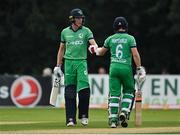 8 September 2021; Ireland batsmen Harry Tector, left, and William Porterfield during match one of the Dafanews International Cup ODI series between Ireland and Zimbabwe at Stormont in Belfast. Photo by Seb Daly/Sportsfile