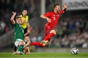 8 September 2021; Silvan Widmer of Switzerland in action against Alistair McCann of Northern Ireland during the FIFA World Cup 2022 qualifying group C match between Northern Ireland and Switzerland at National Football Stadium at Windsor Park in Belfast. Photo by Stephen McCarthy/Sportsfile