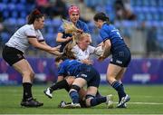 4 September 2021; Taryn Schutzler of Ulster is tackled by Emma Murphy, left, and Jennie Finlay of Leinster during the IRFU Women's Interprovincial Championship Round 2 match between Leinster and Ulster at Energia Park in Dublin. Photo by Piaras Ó Mídheach/Sportsfile