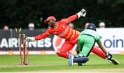 10 September 2021; Simi Singh of Ireland is run out by Zimbabwe wicketkeeper Regis Chakabva during match two of the Dafanews International Cup ODI series between Ireland and Zimbabwe at Stormont in Belfast. Photo by Ramsey Cardy/Sportsfile
