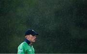 10 September 2021; Harry Tector of Ireland leaves the pitch during a heavy rain shower during match two of the Dafanews International Cup ODI series between Ireland and Zimbabwe at Stormont in Belfast. Photo by Ramsey Cardy/Sportsfile
