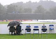 10 September 2021; Spectators await the resumption of play during heavy rain during match two of the Dafanews International Cup ODI series between Ireland and Zimbabwe at Stormont in Belfast. Photo by Ramsey Cardy/Sportsfile