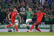 8 September 2021; Jordan Thompson of Northern Ireland in action against Manuel Akanji of Switzerland during the FIFA World Cup 2022 qualifying group C match between Northern Ireland and Switzerland at National Football Stadium at Windsor Park in Belfast. Photo by Stephen McCarthy/Sportsfile