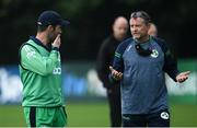 10 September 2021; Ireland head coach Graham Ford, right, and captain Andrew Balbirnie during a rain delay during match two of the Dafanews International Cup ODI series between Ireland and Zimbabwe at Stormont in Belfast. Photo by Ramsey Cardy/Sportsfile