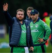 10 September 2021; Paul Stirling, left, and Andrew McBrine of Ireland following the abandonment of match two of the Dafanews International Cup ODI series between Ireland and Zimbabwe at Stormont in Belfast. Photo by Ramsey Cardy/Sportsfile