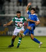 10 September 2021; Phoenix Patterson of Waterford in action against Roberto Lopes of Shamrock Rovers during the SSE Airtricity League Premier Division match between Shamrock Rovers and Waterford at Tallaght Stadium in Dublin. Photo by Stephen McCarthy/Sportsfile