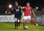 10 September 2021; David Cawley of Sligo Rovers in action against Ian Bermingham of St Patrick's Athletic during the SSE Airtricity League Premier Division match between Sligo Rovers and St Patrick's Athletic at The Showgrounds in Sligo. Photo by Ben McShane/Sportsfile