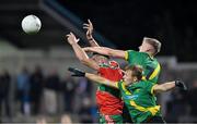 10 September 2021; Fiach Andrews of Ballymun Kickhams in action against Cian Murphy, right, and Adam Fallon of Thomas Davis during the Go Ahead Dublin Senior Club Football Championship Group 1 match between Ballymun Kickhams and Thomas Davis at Parnell Park in Dublin. Photo by Daire Brennan/Sportsfile