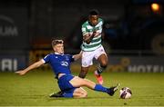 10 September 2021; Aidomo Emakhu of Shamrock Rovers in action against Cameron Evans of Waterford during the SSE Airtricity League Premier Division match between Shamrock Rovers and Waterford at Tallaght Stadium in Dublin. Photo by Stephen McCarthy/Sportsfile