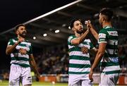 10 September 2021; Danny Mandroiu of Shamrock Rovers is congratulated by team-mates Richie Towell, centre, and Roberto Lopes, left, after scoring their second goal during the SSE Airtricity League Premier Division match between Shamrock Rovers and Waterford at Tallaght Stadium in Dublin. Photo by Stephen McCarthy/Sportsfile