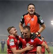 10 September 2021; Shelbourne players Ally Gilchrist, Georgie Poynton and Brendan Clarke celebrate after the SSE Airtricity League First Division match between Cork City and Shelbourne at Turner Cross in Cork. Photo by Michael P Ryan/Sportsfile