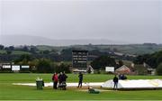 11 September 2021; Groundstaff tend to the playing area before the Clear Currency Women's All-Ireland T20 Cup Semi-Final match between Bready and CSNI at Bready Cricket Club in Tyrone. Photo by Ben McShane/Sportsfile