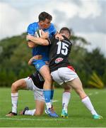 11 September 2021; Charlie Tector of Leinster is tackled by James Humphreys, left, and Shea O’Brien of Ulster during the Development Interprovincial match between Leinster XV and Ulster XV at the IRFU High Performance Centre, on the Sport Ireland Campus in Dublin. Photo by Seb Daly/Sportsfile
