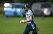 11 September 2021; Jemma Gillan of CSNI leaves the field of play after being caught out by Abbie McKnight of Bready during the Clear Currency Women's All-Ireland T20 Cup Semi-Final match between Bready and CSNI at Bready Cricket Club in Tyrone. Photo by Ben McShane/Sportsfile