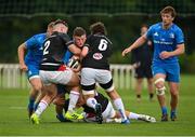 11 September 2021; Fionn Gibbons of Leinster is tackled by James McCormick, left, and Lorcan McLoughlin of Ulster during the Development Interprovincial match between Leinster XV and Ulster XV at the IRFU High Performance Centre, on the Sport Ireland Campus in Dublin. Photo by Seb Daly/Sportsfile