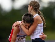 11 September 2021; Lucy Foster of Ulster, left, is congratulated by her sister and second placed Kirsti Foster of Ulster after winning the Girl's 1500 metre during the Irish Life Health Tailteann Schools' Inter-provincial Games at Morton Stadium in Santry, Dublin. Photo by Harry Murphy/Sportsfile