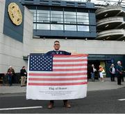 11 September 2021; Michael Burke, from The Bronx, New York, holding a flag with the names of those that lost their lives on 9/11, before the GAA Football All-Ireland Senior Championship Final match between Mayo and Tyrone at Croke Park in Dublin. Photo by Ramsey Cardy/Sportsfile
