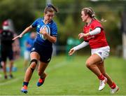 11 September 2021; Eva Sterrit of Leinster in action against  Kate Flannery of Munster during the PwC U18 Women’s Interprovincial Championship Round 3 match between Leinster and Munster at MU Barnhall in Leixlip, Kildare. Photo by Michael P Ryan/Sportsfile