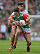 11 September 2021; Conor Loftus of Mayo is tackled by Conor McKenna of Tyrone during the GAA Football All-Ireland Senior Championship Final match between Mayo and Tyrone at Croke Park in Dublin. Photo by Brendan Moran/Sportsfile