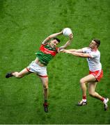 11 September 2021; Diarmuid O'Connor of Mayo in action against Brian Kennedy of Tyrone the GAA Football All-Ireland Senior Championship Final match between Mayo and Tyrone at Croke Park in Dublin. Photo by Daire Brennan/Sportsfile