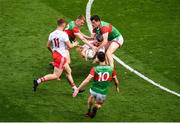 11 September 2021; Matthew Donnelly of Tyrone in action against Bryan Walsh, left, and Stephen Coen of Mayo the GAA Football All-Ireland Senior Championship Final match between Mayo and Tyrone at Croke Park in Dublin. Photo by Daire Brennan/Sportsfile