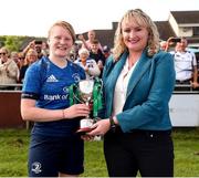 11 September 2021; IRFU committee member Yvonne Comer presents the trophy to Leinster captain Aoife Wafer after the PwC U18 Women’s Interprovincial Championship Round 3 match between Leinster and Munster at MU Barnhall in Leixlip, Kildare. Photo by Michael P Ryan/Sportsfile