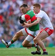 11 September 2021; Michael Plunkett of Mayo in action against Peter Harte of Tyrone during the GAA Football All-Ireland Senior Championship Final match between Mayo and Tyrone at Croke Park in Dublin. Photo by Piaras Ó Mídheach/Sportsfile