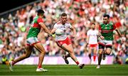 11 September 2021; Brian Kennedy of Tyrone in action against Tommy Conroy, left, and Kevin McLoughlin of Mayo during the GAA Football All-Ireland Senior Championship Final match between Mayo and Tyrone at Croke Park in Dublin. Photo by Seb Daly/Sportsfile