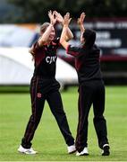 11 September 2021; Louise Little of Pembroke celebrates with team-mate Clíona Tucker, right, after taking the wicket of Stephanie Wilkinson of Bready during the Clear Currency Women’s All-Ireland T20 Cup Final match between Bready cricket club and Pembroke cricket club at Bready Cricket Club in Tyrone. Photo by Ben McShane/Sportsfile