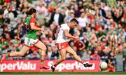11 September 2021; Darren McCurry of Tyrone has a shot on goal under pressure from Pádraig O'Hora of Mayo during the GAA Football All-Ireland Senior Championship Final match between Mayo and Tyrone at Croke Park in Dublin. Photo by Seb Daly/Sportsfile