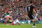 11 September 2021; Aidan O'Shea of Mayo has his shot charged down by Ronan McNamee of Tyrone during the GAA Football All-Ireland Senior Championship Final match between Mayo and Tyrone at Croke Park in Dublin. Photo by Ramsey Cardy/Sportsfile