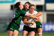 11 September 2021; Fiona Tuite of Ulster is tackled by Catherine Martin, left, and Ciara Farrell of Connacht during the Vodafone Women’s Interprovincial Championship Round 3 match between Connacht and Ulster at Energia Park in Dublin. Photo by Harry Murphy/Sportsfile