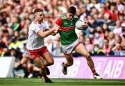 11 September 2021; Lee Keegan of Mayo in action against Niall Sludden of Tyrone during the GAA Football All-Ireland Senior Championship Final match between Mayo and Tyrone at Croke Park in Dublin. Photo by David Fitzgerald/Sportsfile