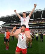 11 September 2021; Tiernan McCann of Tyrone carries team-mate Conor Meyler following victory in the GAA Football All-Ireland Senior Championship Final match between Mayo and Tyrone at Croke Park in Dublin. Photo by Ramsey Cardy/Sportsfile