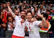 11 September 2021; Pádraig Hampsey, left, and Kieran McGeary of Tyrone celebrate with supporters after the GAA Football All-Ireland Senior Championship Final match between Mayo and Tyrone at Croke Park in Dublin. Photo by David Fitzgerald/Sportsfile