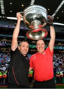 11 September 2021; Tyrone joint-managers Brian Dooher, left, and Feargal Logan celebrate with the Sam Maguire cup after the GAA Football All-Ireland Senior Championship Final match between Mayo and Tyrone at Croke Park in Dublin. Photo by Stephen McCarthy/Sportsfile