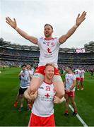11 September 2021; Frank Burns of Tyrone celebrates on the shoulders of team-mate Hugh Pat McGeary after the GAA Football All-Ireland Senior Championship Final match between Mayo and Tyrone at Croke Park in Dublin. Photo by Stephen McCarthy/Sportsfile