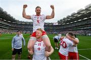 11 September 2021; Frank Burns of Tyrone celebrates on the shoulders of team-mate Hugh Pat McGeary during the GAA Football All-Ireland Senior Championship Final match between Mayo and Tyrone at Croke Park in Dublin. Photo by Stephen McCarthy/Sportsfile