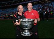 11 September 2021; Tyrone joint-managers Brian Dooher, left, and Feargal Logan celebrate with the Sam Maguire cup after the GAA Football All-Ireland Senior Championship Final match between Mayo and Tyrone at Croke Park in Dublin. Photo by Ramsey Cardy/Sportsfile