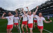 11 September 2021; Tyrone players, from left, Ronan McNamee, Cathal McShane, Frank Burns and Niall Kelly celebrate with the Sam Maguire Cup after the GAA Football All-Ireland Senior Championship Final match between Mayo and Tyrone at Croke Park in Dublin. Photo by Ramsey Cardy/Sportsfile