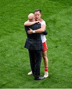 11 September 2021; Former Tyrone captain Peter Canavan celebrates with Kieran McGeary of Tyrone after the GAA Football All-Ireland Senior Championship Final match between Mayo and Tyrone at Croke Park in Dublin. Photo by Daire Brennan/Sportsfile