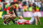 11 September 2021; Lee Keegan of Mayo speaks with Peter Harte of Tyrone and daughter Ava after the GAA Football All-Ireland Senior Championship Final match between Mayo and Tyrone at Croke Park in Dublin. Photo by David Fitzgerald/Sportsfile