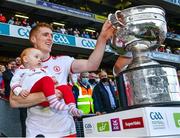 11 September 2021; Peter Harte of Tyrone, holding his 10 month old daughter Ava, prepares to lift the Sam Maguire Cup after the GAA Football All-Ireland Senior Championship Final match between Mayo and Tyrone at Croke Park in Dublin. Photo by Ray McManus/Sportsfile