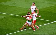 11 September 2021; Pádraig O'Hora of Mayo is fouled by Peter Harte, left, and Kieran McGeary of Tyrone, which referee Joe McQuillan awarded a 13m free for during the GAA Football All-Ireland Senior Championship Final match between Mayo and Tyrone at Croke Park in Dublin. Photo by Daire Brennan/Sportsfile