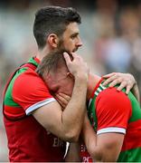 11 September 2021; Ryan O'Donoghue of Mayo is consoled by team-mate Brendan Harrison after the GAA Football All-Ireland Senior Championship Final match between Mayo and Tyrone at Croke Park in Dublin. Photo by Brendan Moran/Sportsfile